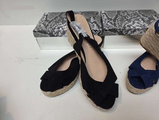 SANDALIA DE CUÑA BAJA ANTELINA. Stock Liquidacion