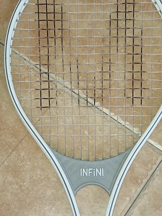 Raqueta de tenis infini