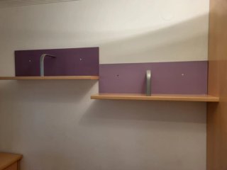 Habitación juvenil con armario y estudio