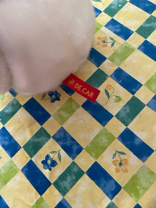 Orsetto peluche bianco con fiocco rosso