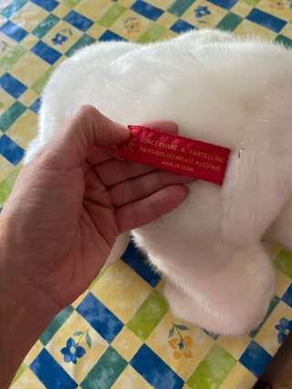 Orsetto peluche bianco con fiocco rosso