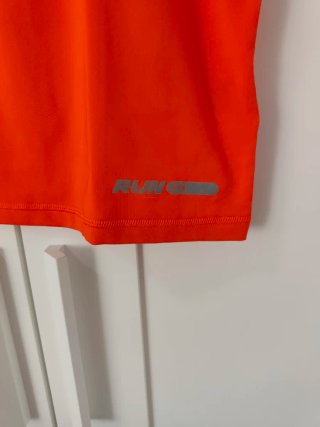 Camiseta running naranja hombre