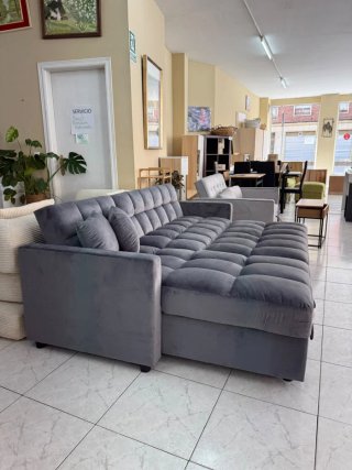 Sofá cama gris de tela