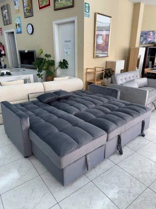 Sofá cama gris de tela
