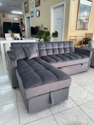 Sofá cama gris de tela
