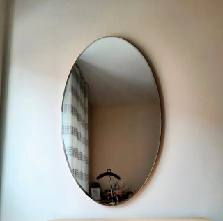 Specchio ovale per camera da letto