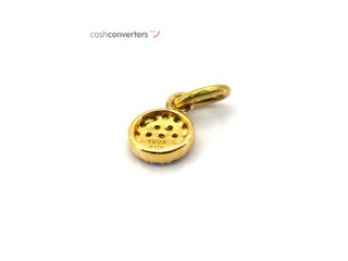 colgante oro 18k con piedra con diamante