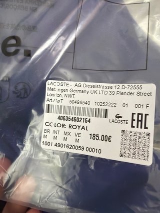 Sudadera Lacoste morada con etiqueta