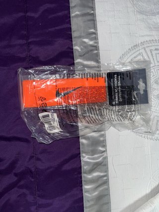 Banda per tennis Nike arancione