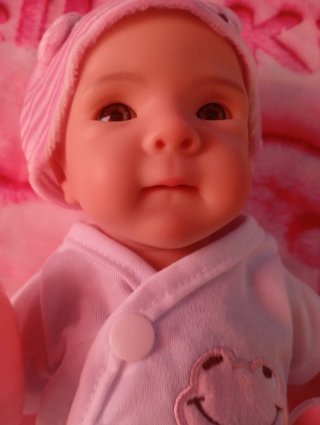 Muñeca silicona suave pintada