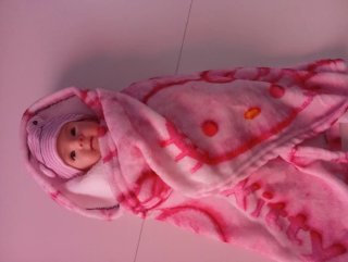Muñeca silicona suave pintada