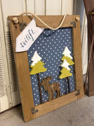 Decorazione artigianale in legno da appendere