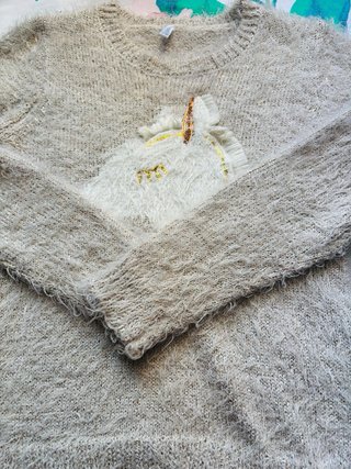 Maglione unicorno peloso