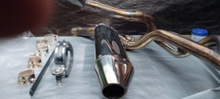 Tubo de escape moto DELKEVIC
