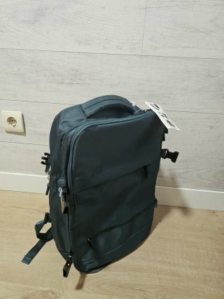 Mochila de viaje verde azulado.