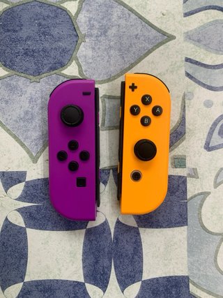 Coppia di Joycons Nintendo Switch Viola Arancione Nuovi