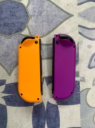 Coppia di Joycons Nintendo Switch Viola Arancione Nuovi
