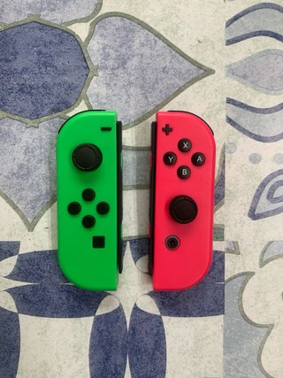 Coppia di Joycons Nintendo Switch Verde Rosa Fucsia