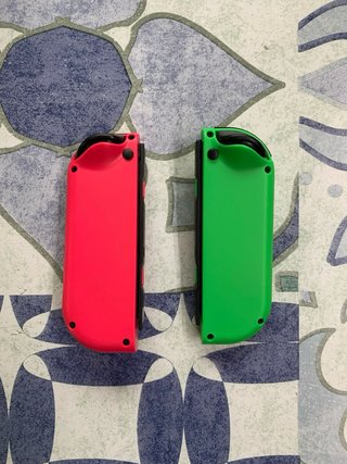 Coppia di Joycons Nintendo Switch Verde Rosa Fucsia