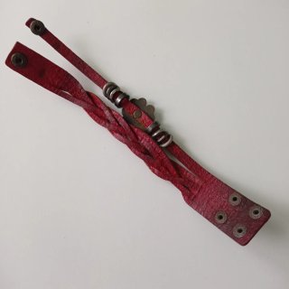 Pulsera imitación cuero trenzada con flor