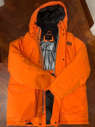 Plumífero niño naranja talla 38