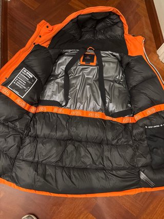 Plumífero niño naranja talla 38