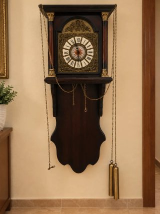 Reloj de péndulo antiguo