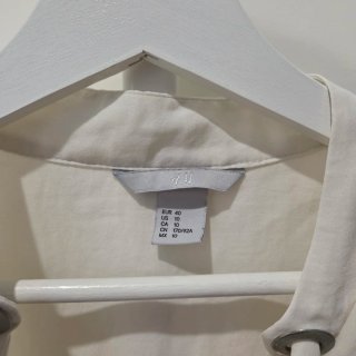 Blusa H&M sin mangas lazo cuello