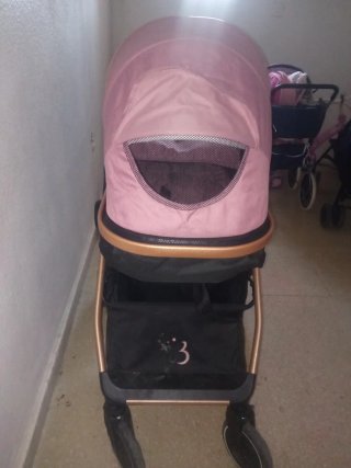 Cochecito bebé niña rosa