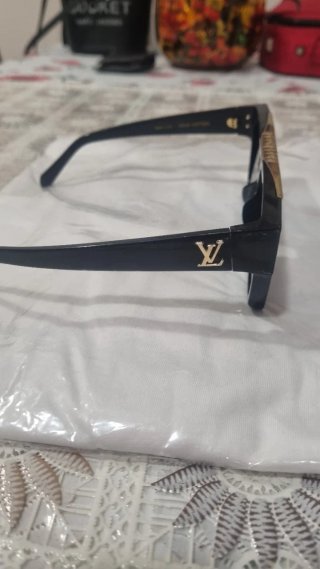 Gafas de sol Louis Vuitton negras y doradas