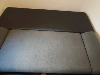 Sofá cama gris y negro