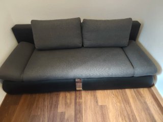 Sofá cama gris y negro
