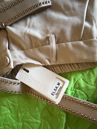 Pantaloni avorio con cintura borchie