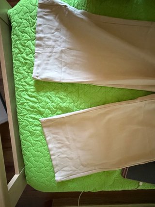 Pantaloni avorio con cintura borchie