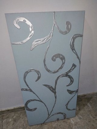 Lienzo decorativo azul y plateado