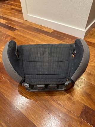 Alzador de coche para niños