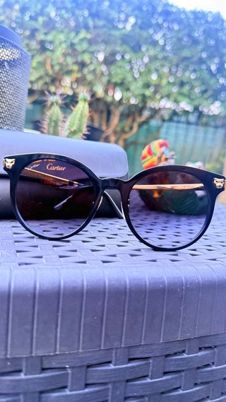 Occhiali da sole Cartier neri e oro