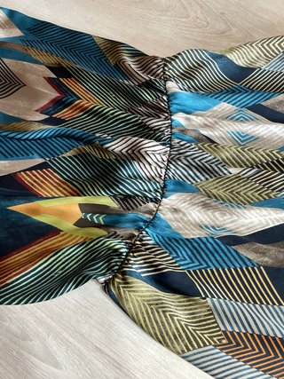Vestito corto smanicato fantasia geometrica