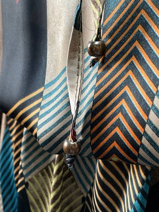 Vestito corto smanicato fantasia geometrica