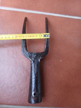 Herramienta agrícola antigua