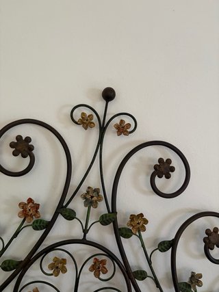 Cabecero forja flores dormitorio de matrimonio