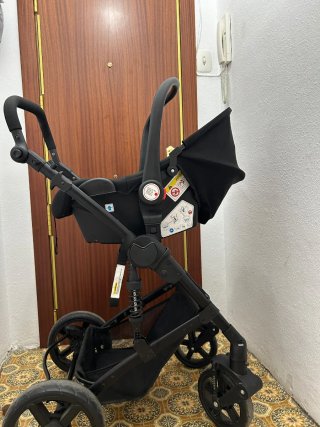Silla de paseo para bebé con plástico de lluvia