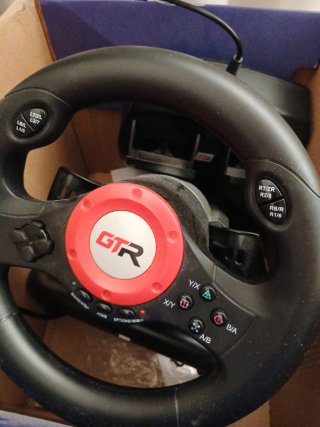Volante y pedales para  juegos