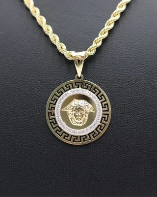 COLGANTE REDONDO MEDUSA GRECA Y CIRCONITAS.Oro 18K