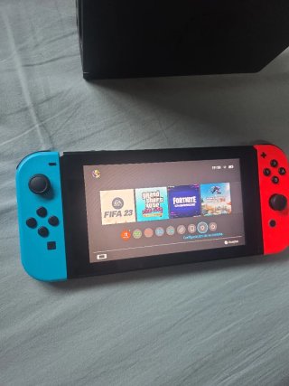 Nintendo Switch Azul/Rojo con Dock y Cargador