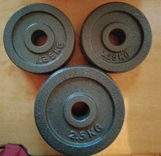 Discos de pesas 2.5 kgx2 unidades y 4 discos 1,25
