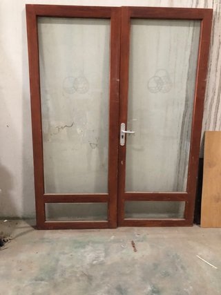Puerta doble madera y cristal 210x163
