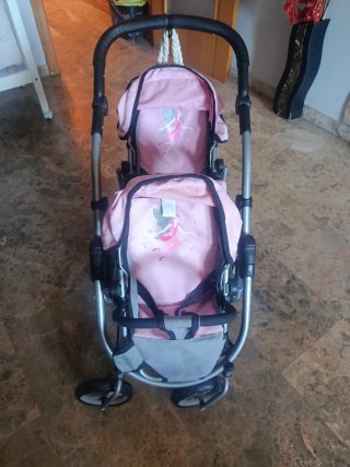 Carrito gemelar rosa con hadas