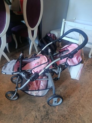 Carrito gemelar rosa con hadas