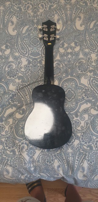 Ukelele con funda y afinador
